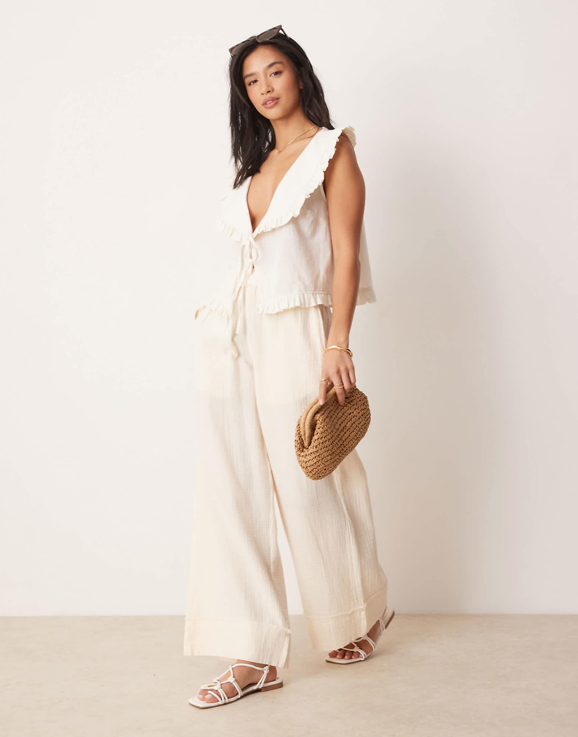 ASOS DESIGN Petite cheesecloth pull on pants with raw edge in buttermilk