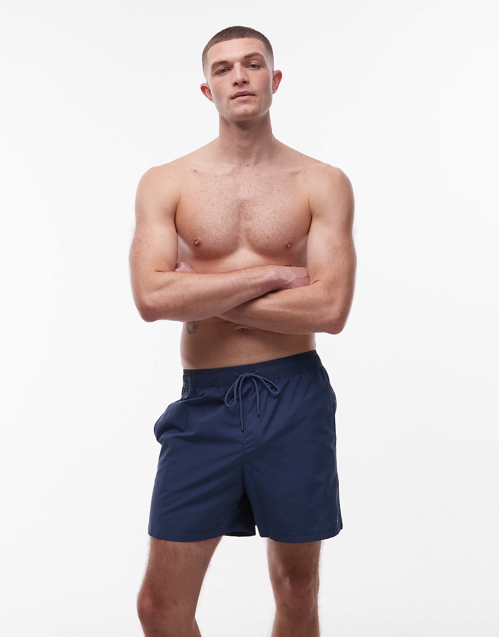 Tommy Hilfiger drawstring swim shorts with side logo tape in blue