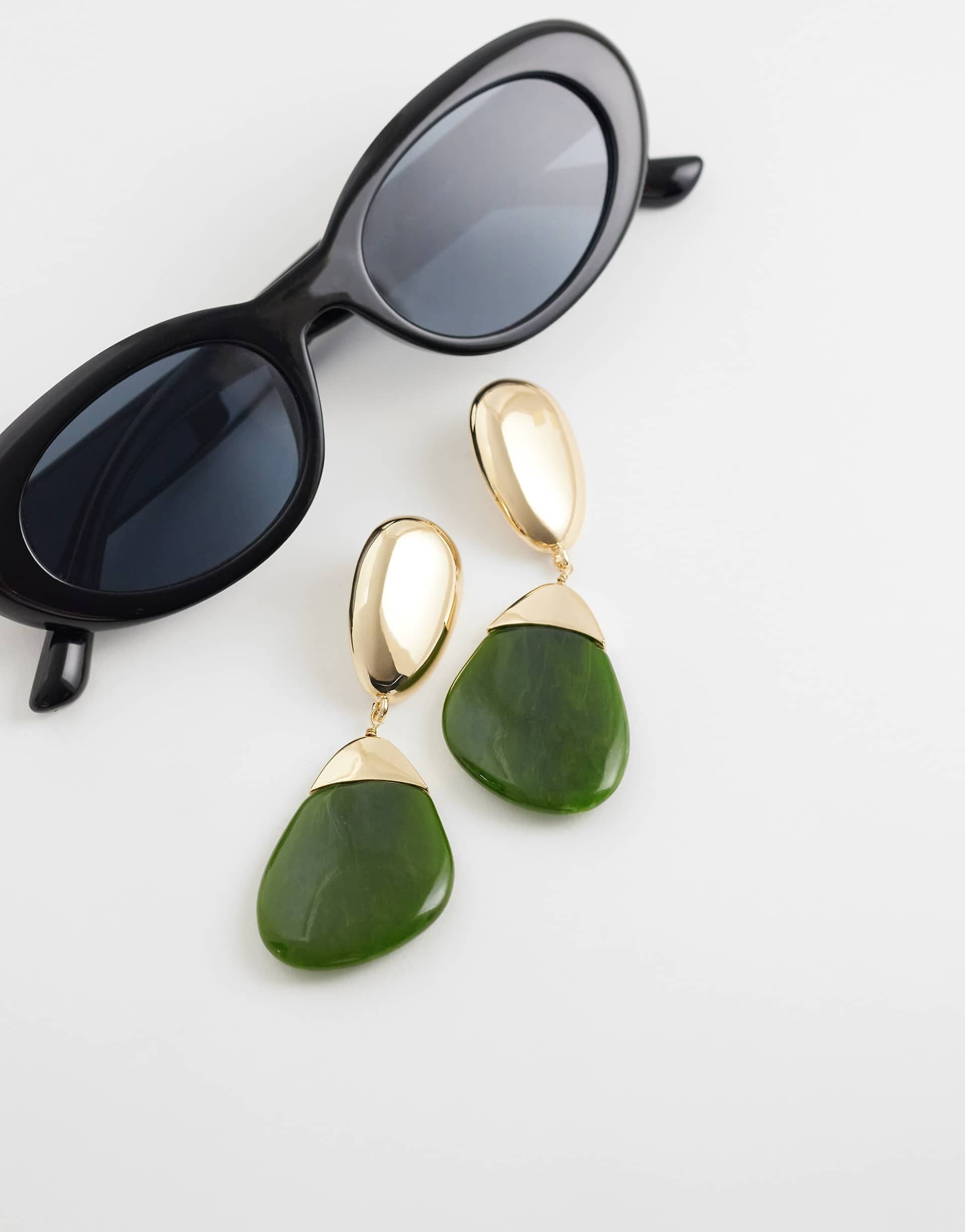 ASOS DESIGN pendant drop earrings with green resin in gold tone