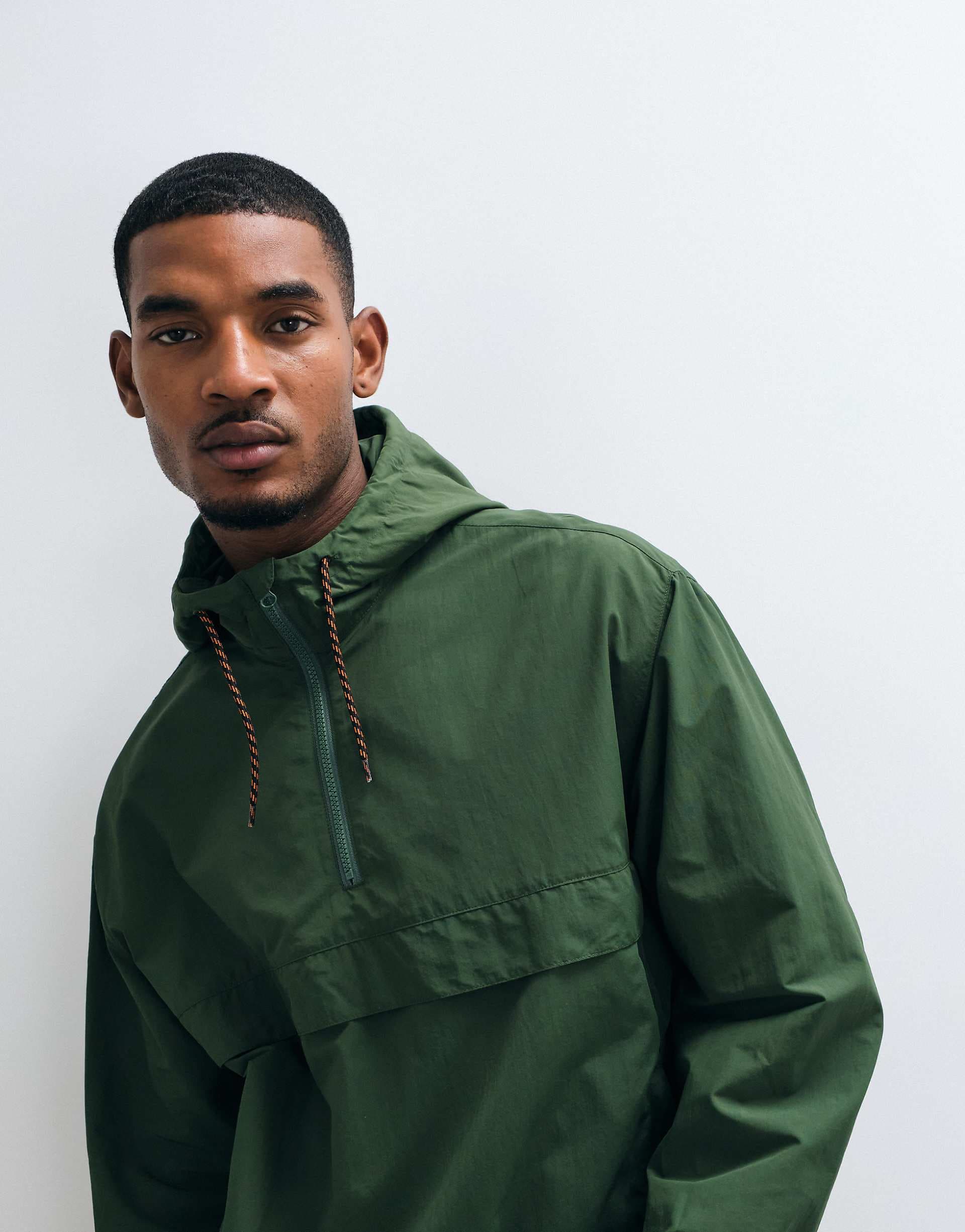 ASOS DESIGN stormMAX™ water repellent overhead rain jacket in dark green