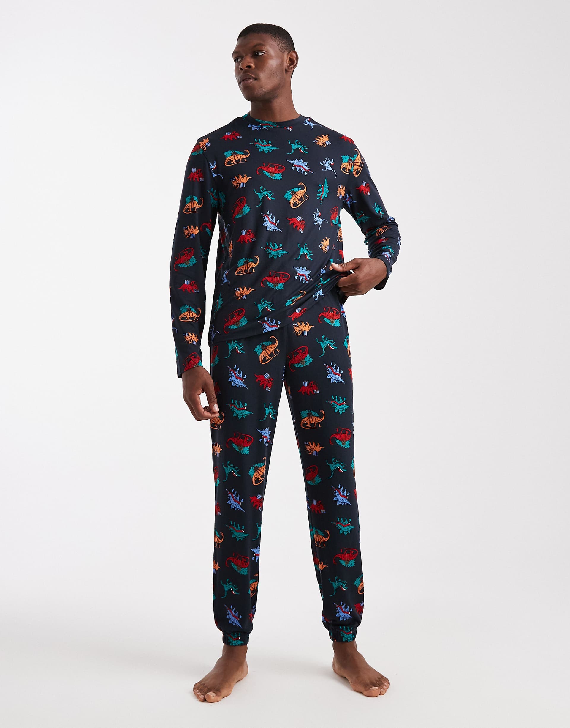 Urban Threads Christmas long sleeve crew and pajama bottoms in navy dinosaur print
