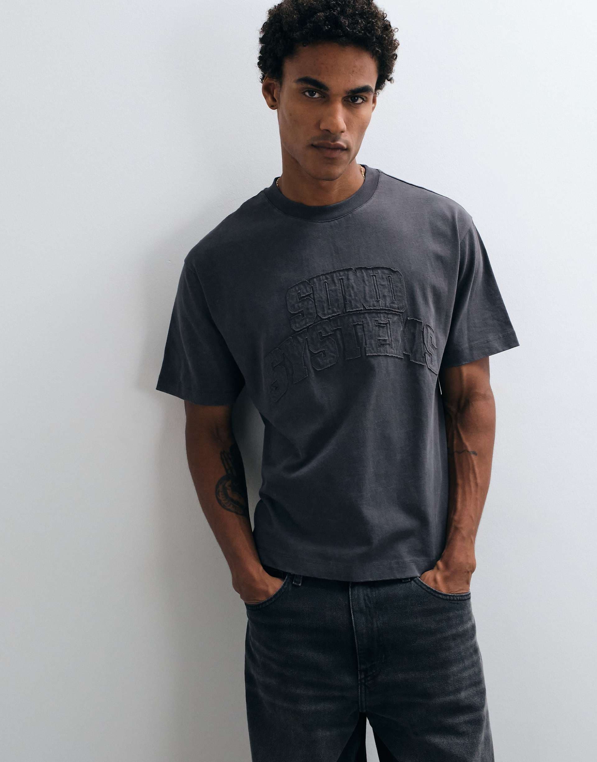 ASOS DESIGN boxy relaxed t-shirt with distressed appliqué in gray wash