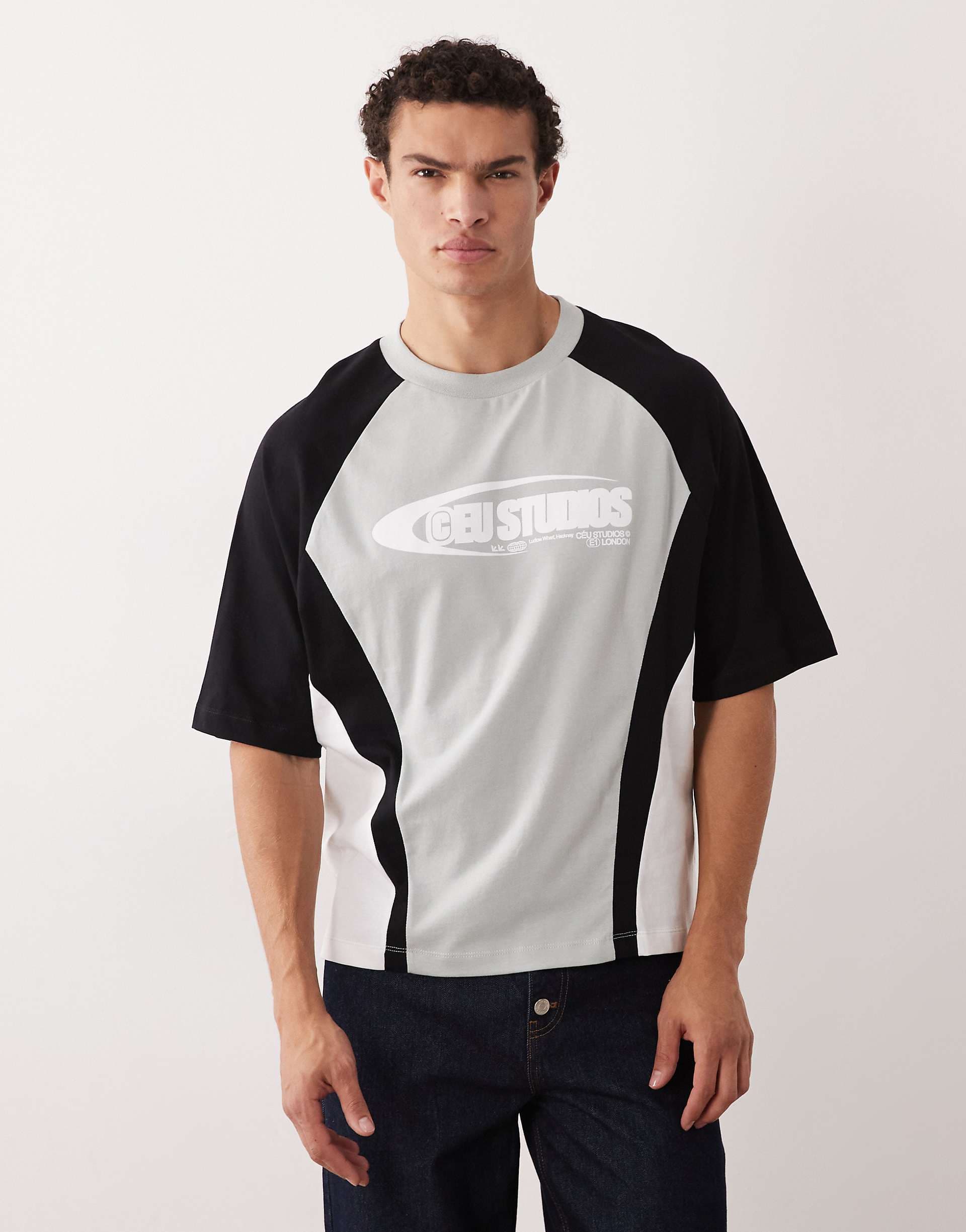 ASOS DESIGN boxy oversized t-shirt with cut and sew paneling and athletic graphics in light gray