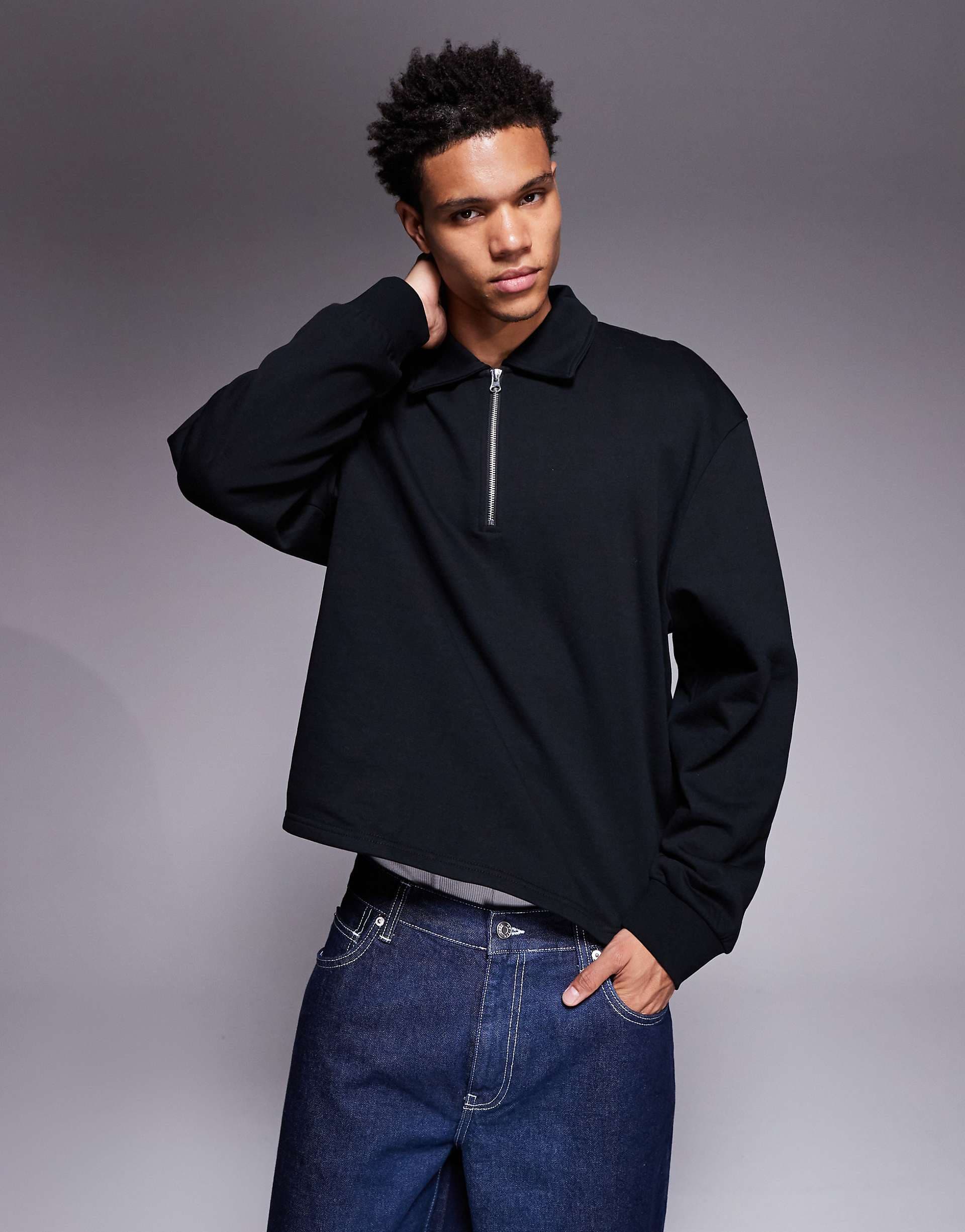 ASOS DESIGN boxy relaxed quarter zip sweatshirt with collar in black