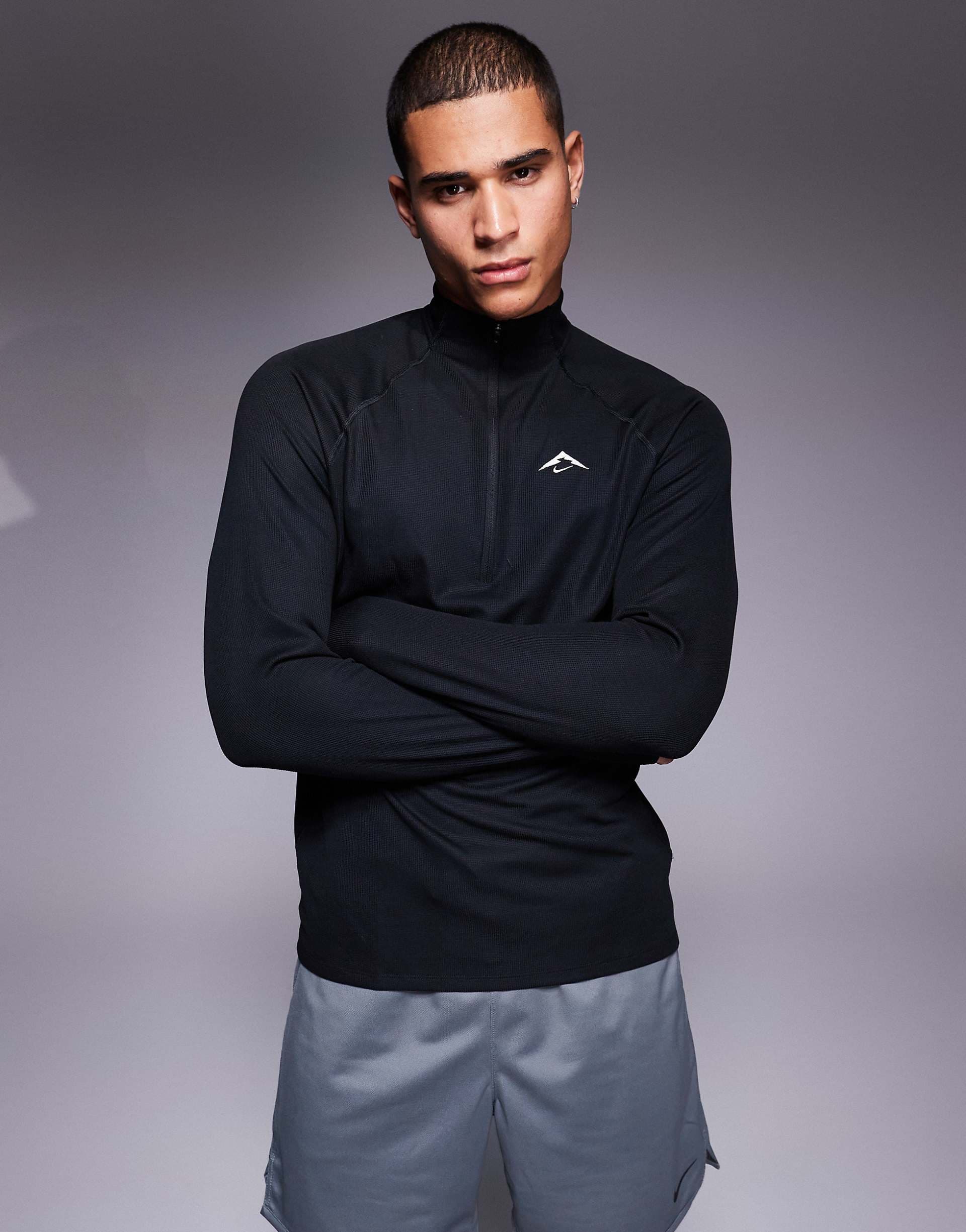 Nike Running Trail logo half zip sweatshirt in black