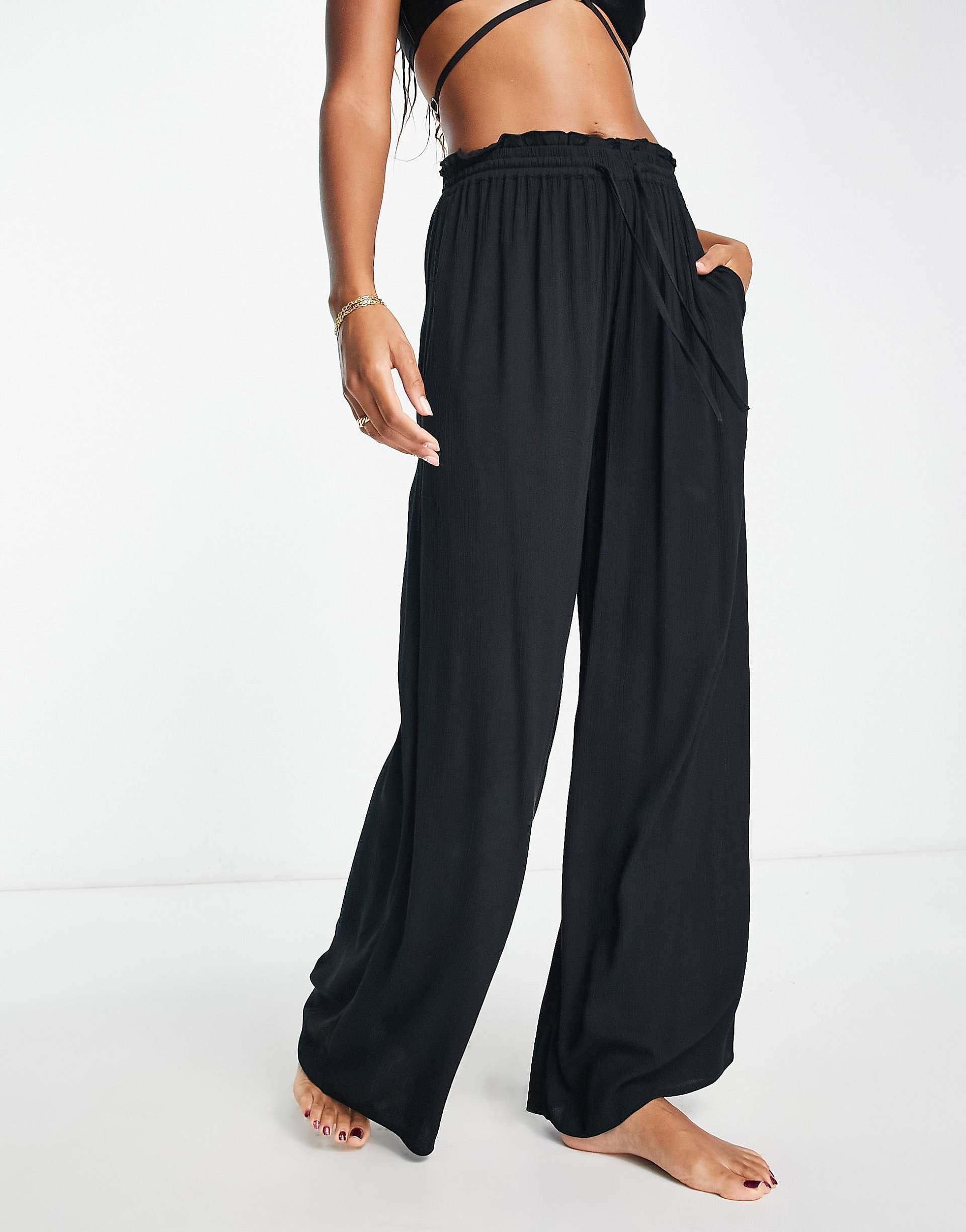 Iisla & Bird Exclusive beach drawstring pants in black