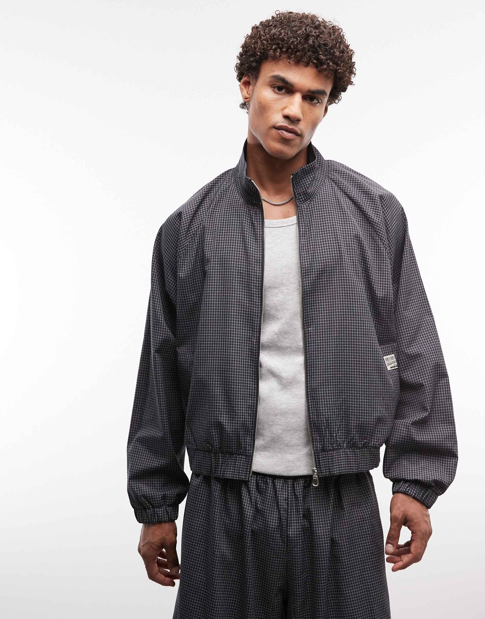 COLLUSION oversized hooded track jacket in black plaid