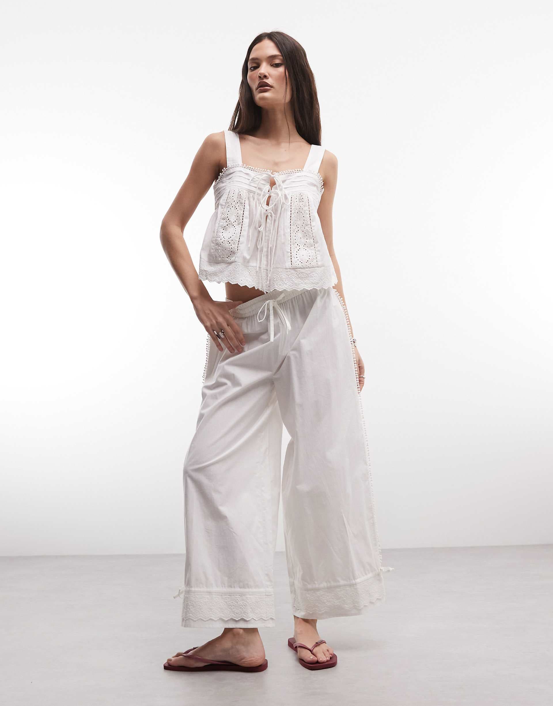 Reclaimed Vintage cropped balloon pants with eyelet hem in white