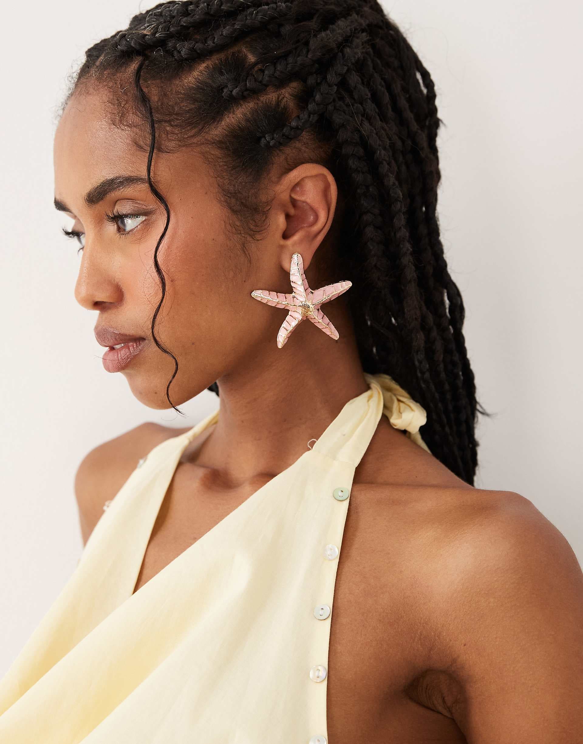 ASOS DESIGN large earrings with star-fish design in pink and gold tone