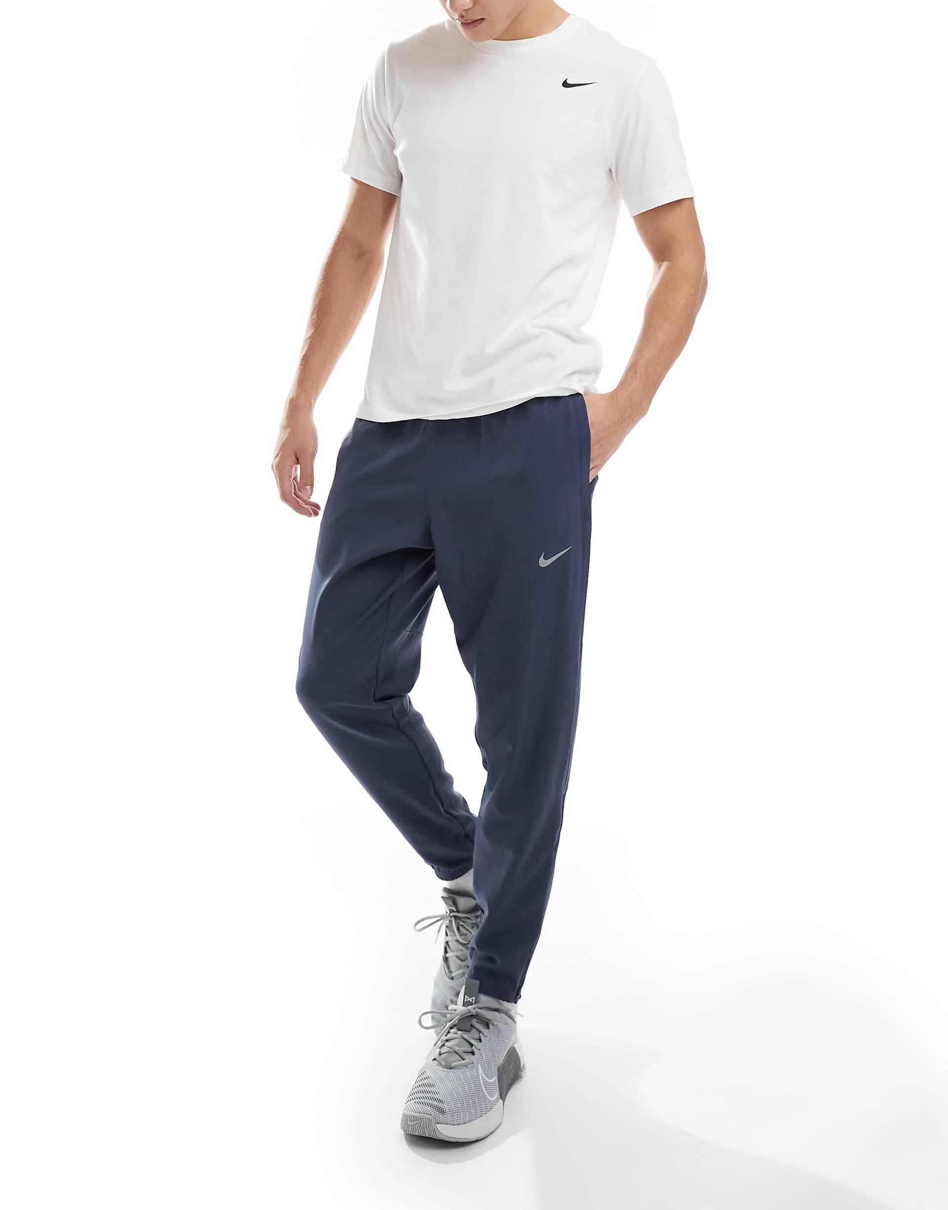 Nike Running Challenger woven sweatpants in navy