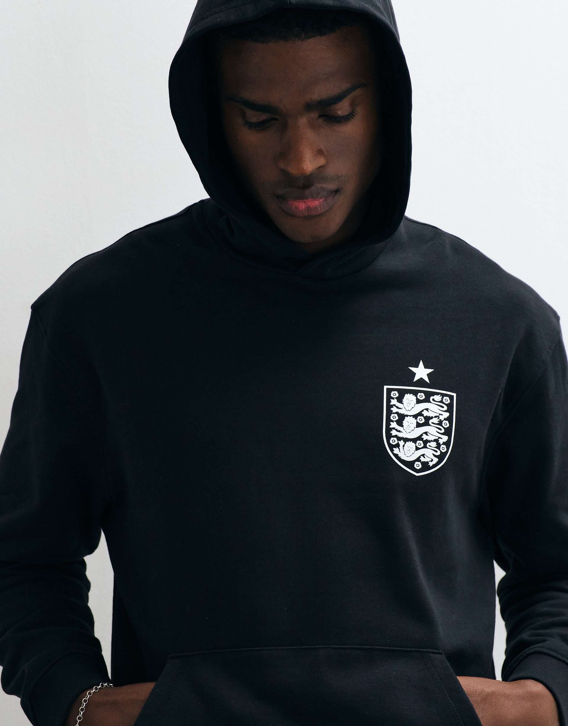 ASOS DESIGN relaxed hoodie with FA England Three Lions print in black