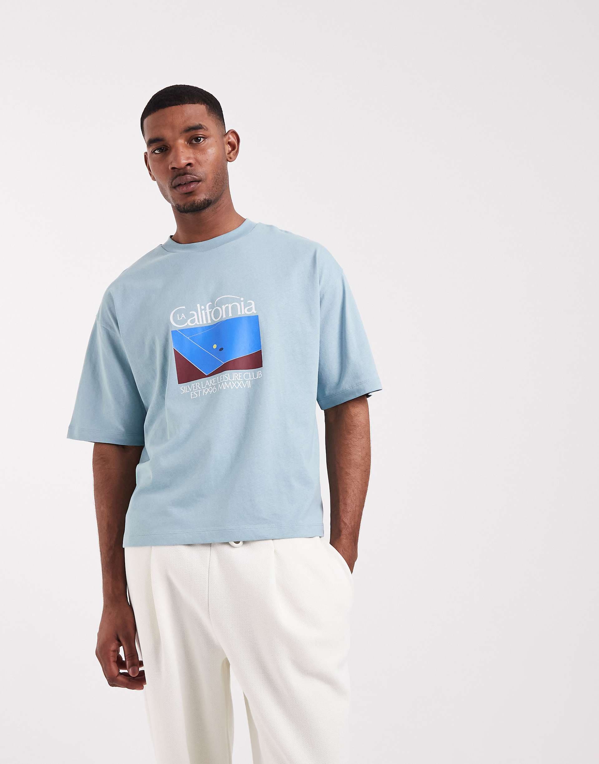 ASOS DESIGN boxy oversized t-shirt with tennis graphic in blue