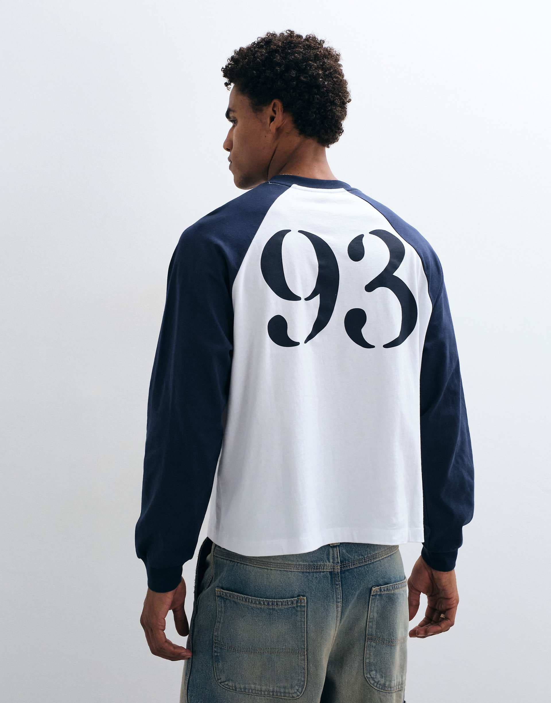 ASOS DESIGN boxy oversized raglan T-shirt with 93 graphic in white