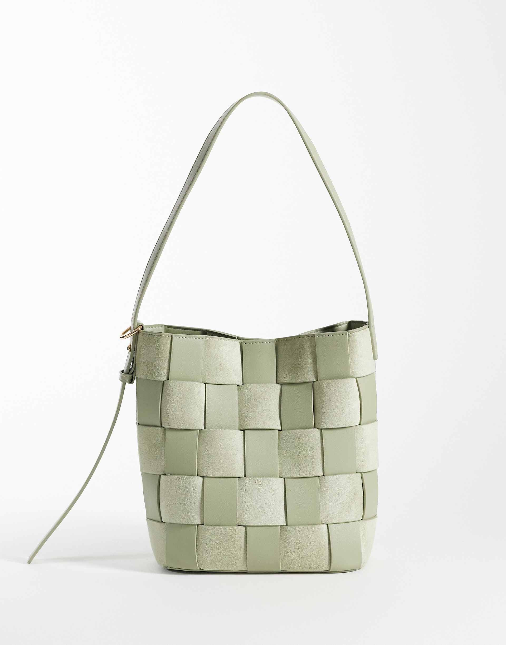 ASOS DESIGN faux suede and faux leather woven bucket tote in sage