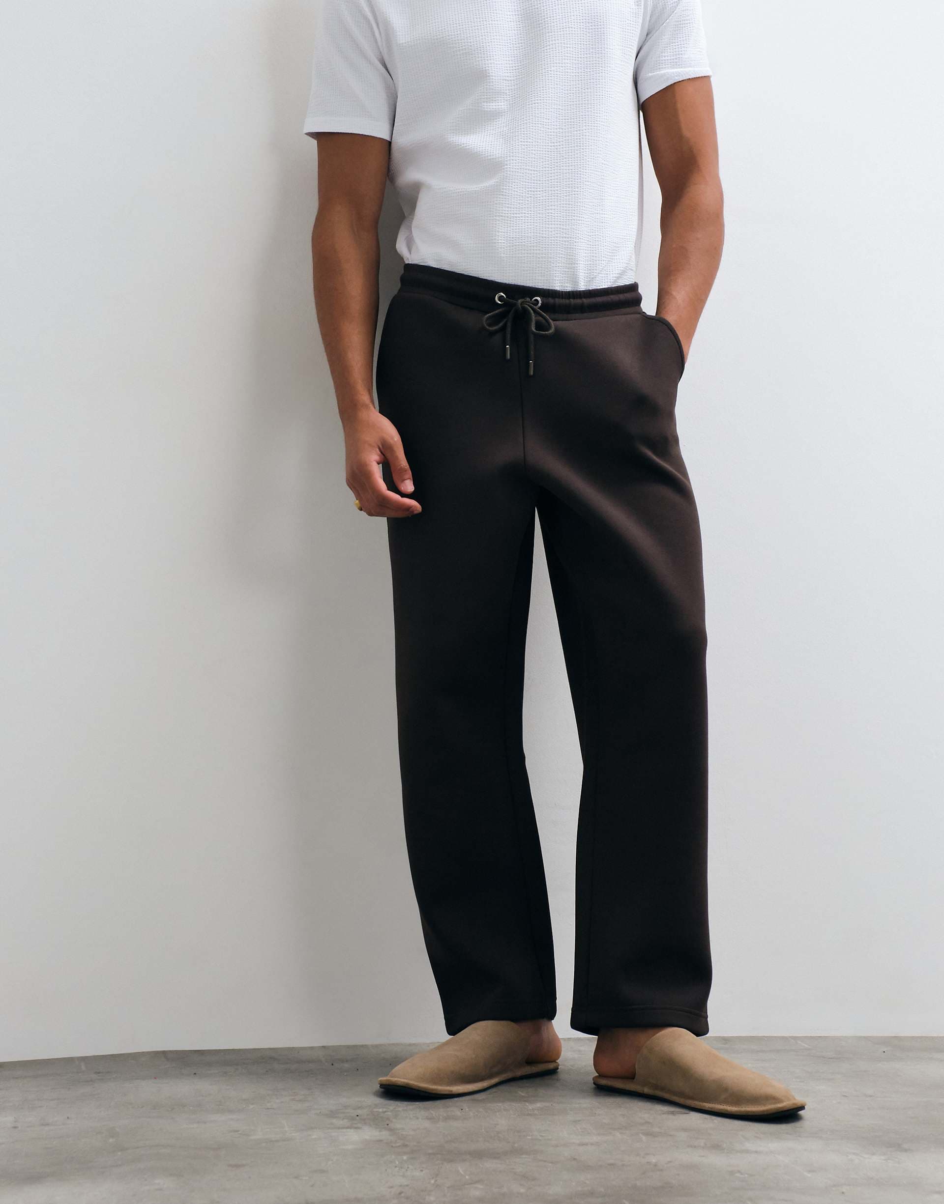 ASOS DESIGN relaxed tapered sweatpants with silver hardware detail in scuba-style fabric in torte