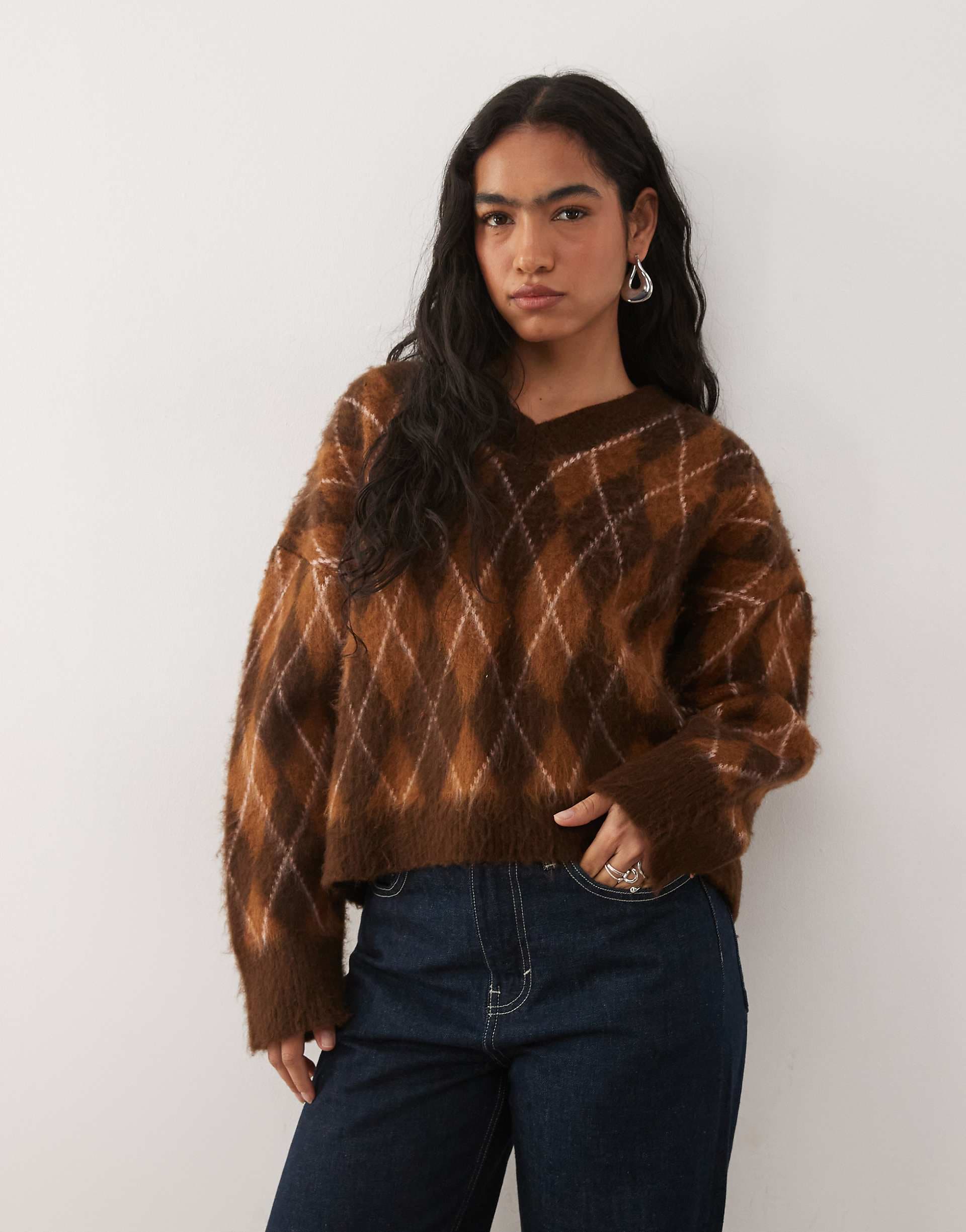 Reclaimed Vintage v-neck sweater in brown and orange argyle