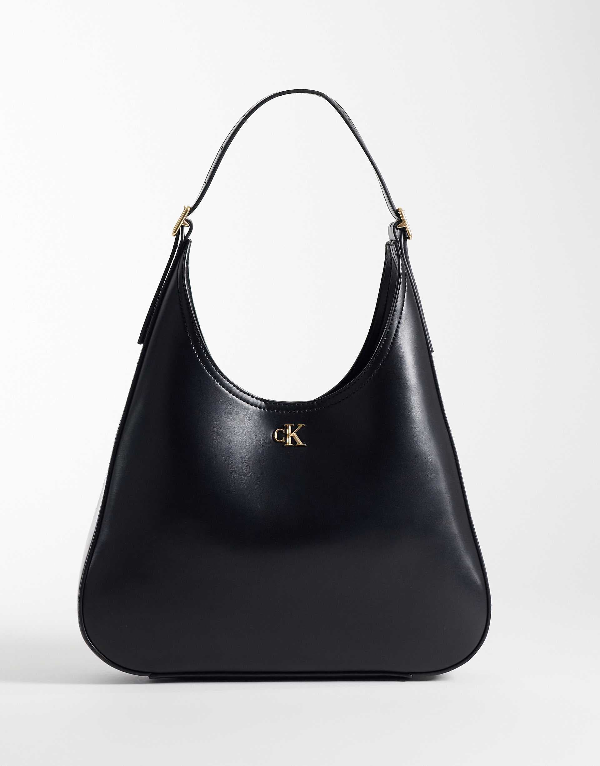 Calvin Klein large sleek bucket bag with gold details in black