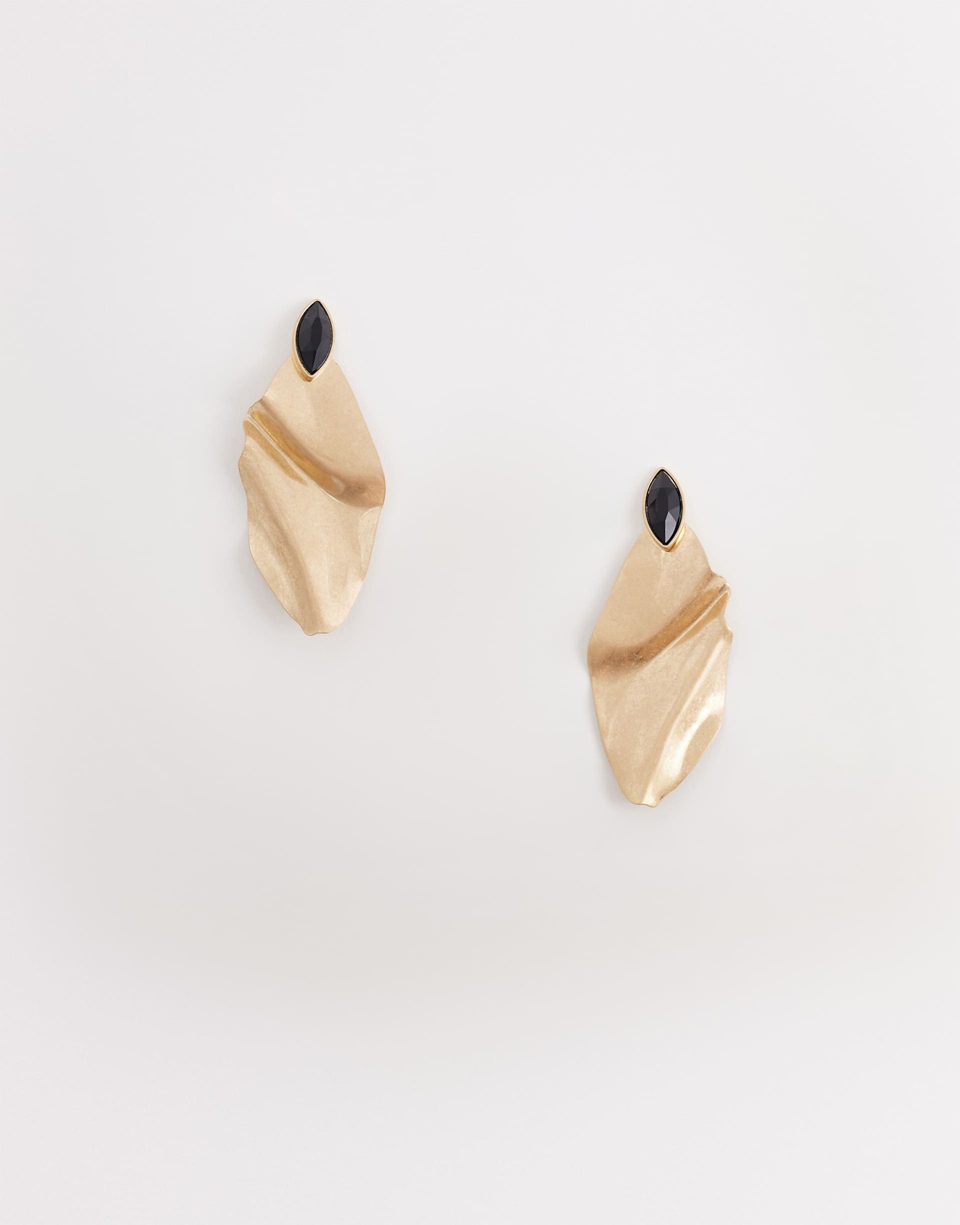 ASOS DESIGN large studs with black stone setting in brushed gold tone