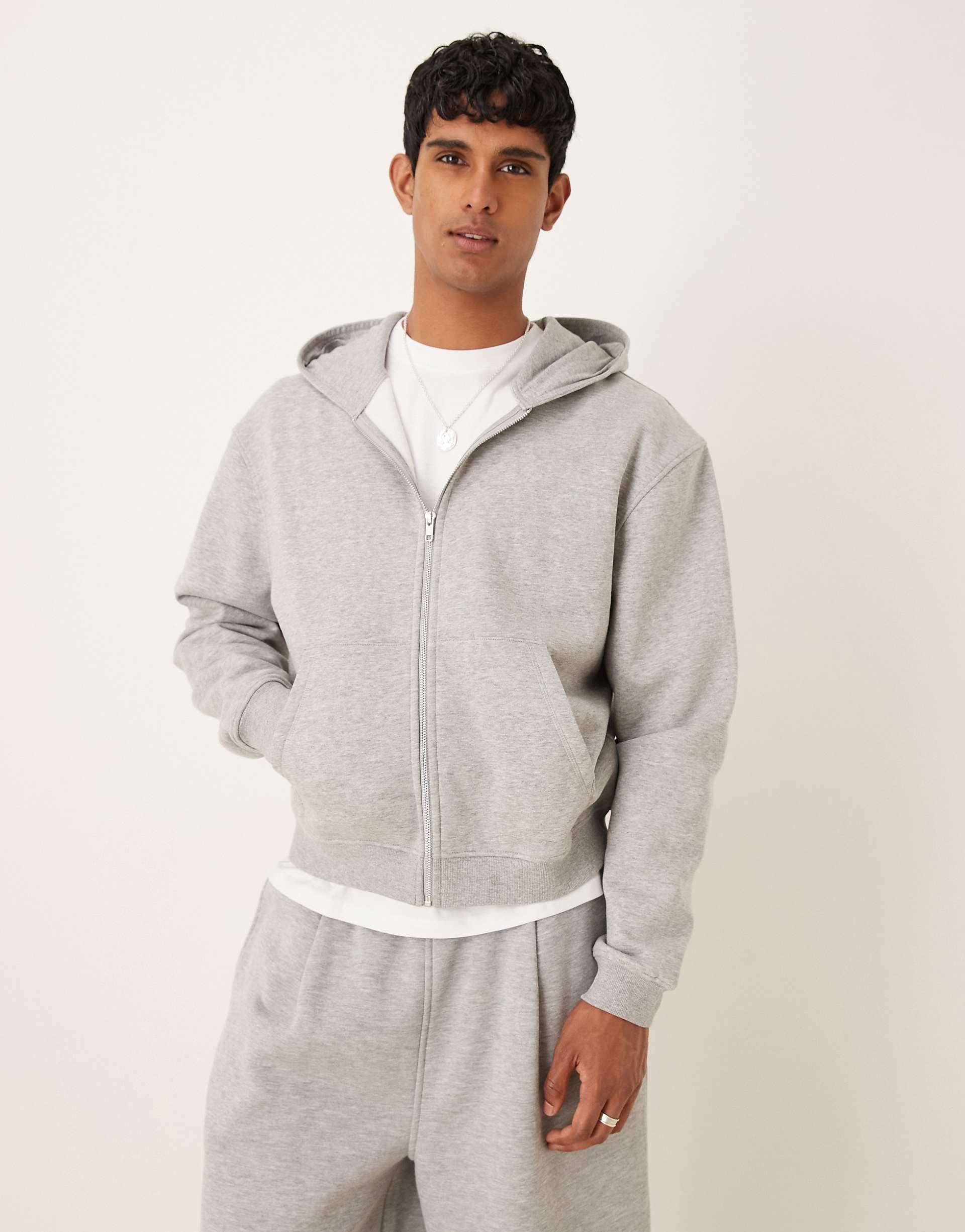 ASOS DESIGN Essentials boxy relaxed zip through hoodie in gray heather