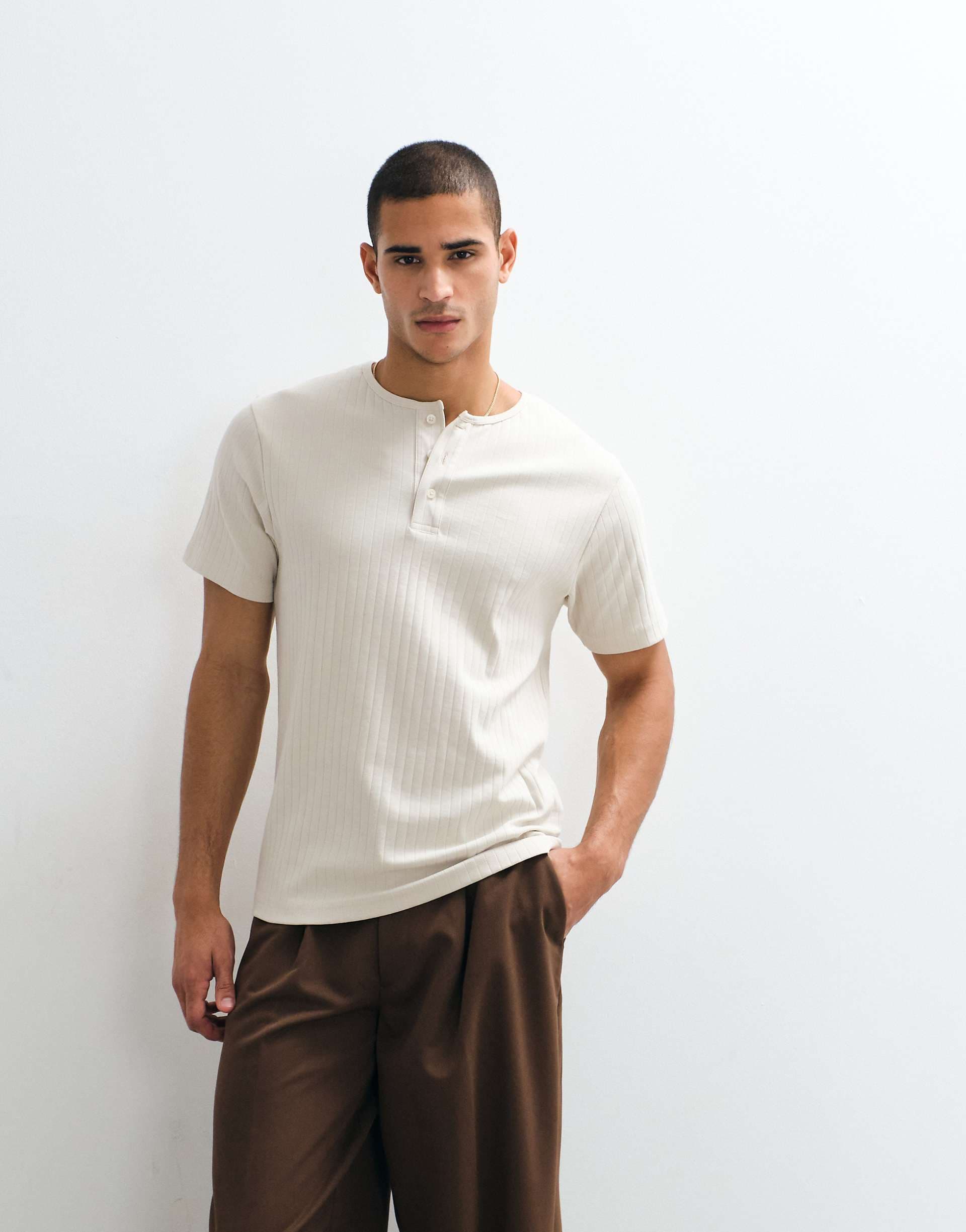 ASOS DESIGN heavyweight regular fit ribbed T-shirt with henley neck in beige
